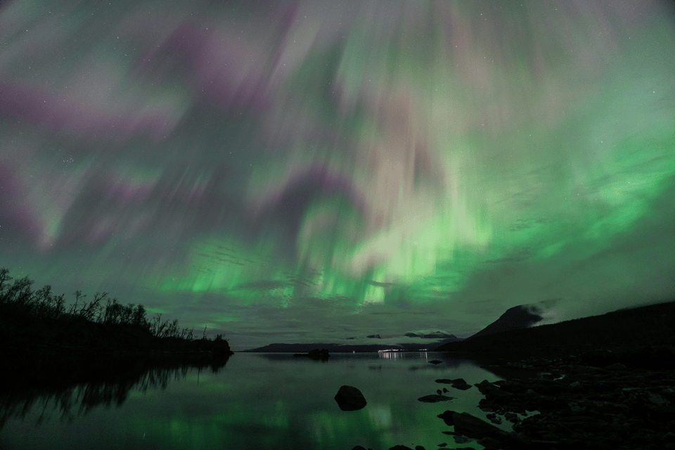 Abisko: Guided Autumn Aurora Chase with Hotel Transfers - Björkliden and Bear Mountain bring a mountain setting