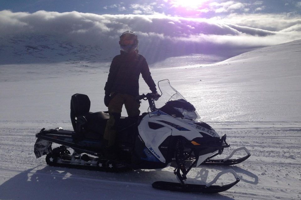 Abisko: Snowmobile Sled Expedition with Snack and Hot Drink - Getting dressed for the snow