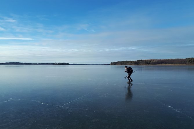 Beginner friendly Nordic Ice Skating On lakes in Stockholm - Getting fitted with Nordic skates and safety gear