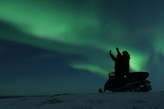 Enjoy the Aurora show on top of the mountain inc tipi dinner - Riding a snowmobile through the dark