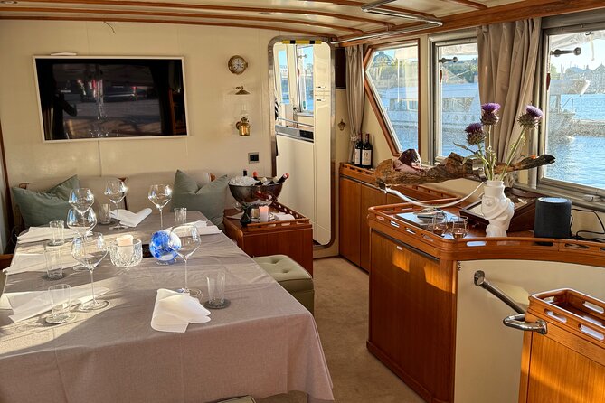 Exclusive Yacht Tour of Stockholm: sunset, dinner, lunch, cruise - Passing Fjäderholmarna Without Going Ashore