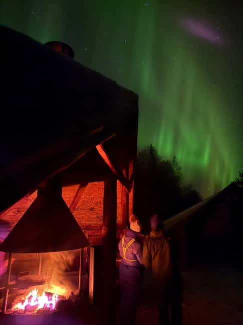 Guarantee Northern Lights Hunt by Minibus With Local Guide - Waiting under blankets for the sky to change
