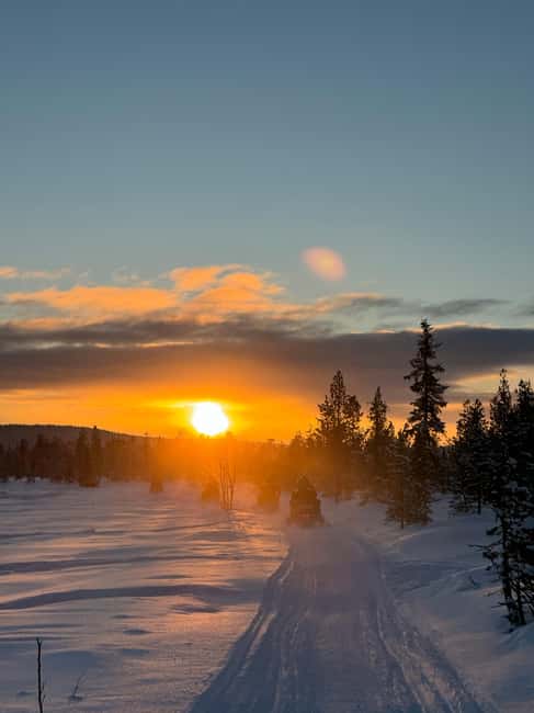 Kiruna: Guided Snowmobile Tour and Swedish Fika Experience - Frozen lakes, rivers, forests, and open Arctic views