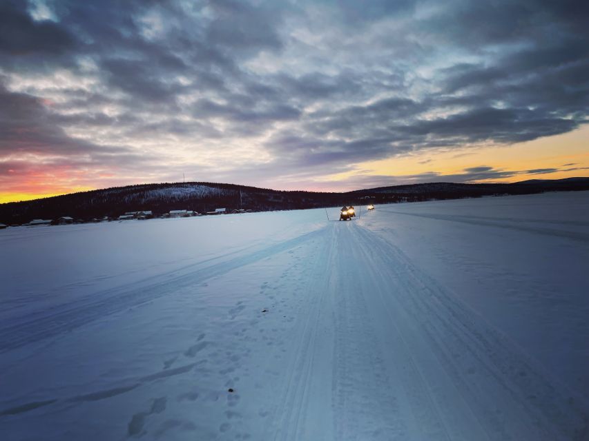 Kiruna: Guided Snowmobile Tour and Swedish Fika Experience - Sharing a snowmobile and managing the effort