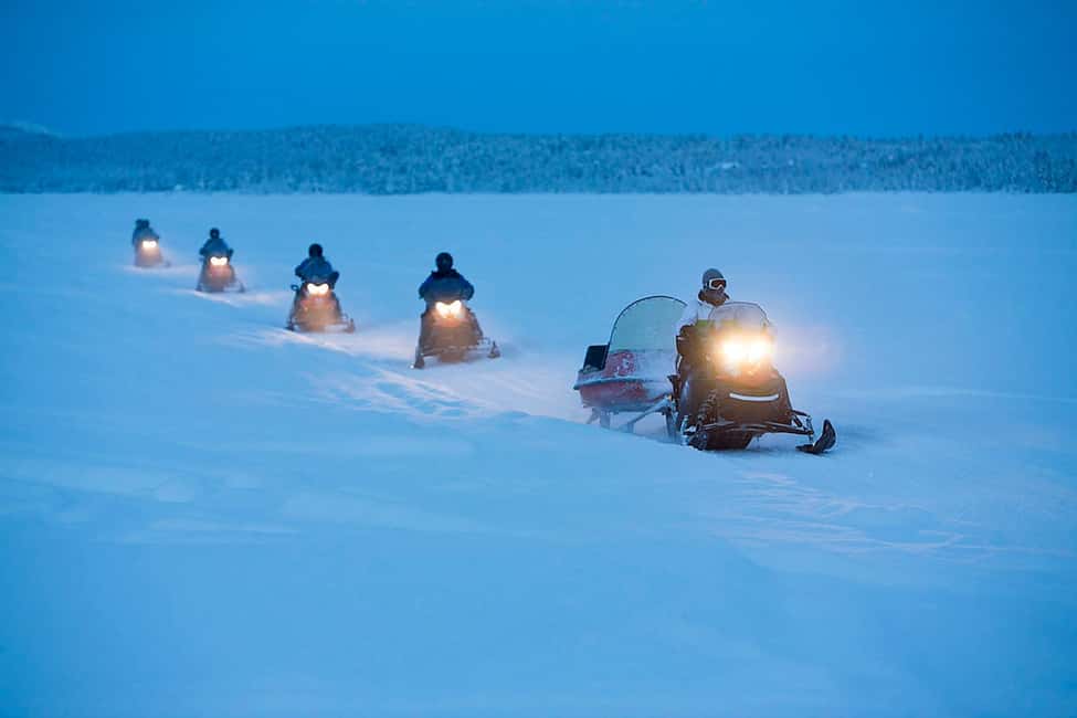 Kiruna: Guided Snowmobile Tour with Coffee Break - Leaving Kiruna for the Torne River Valley