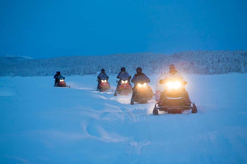 Kiruna: Northern Lights Snowmobile Tour with Transfer - Setting out from Kiruna after dark