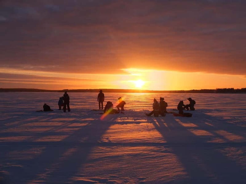 Lulea: Ice Fishing Tour in the heart of the city with Guide - Waiting on reindeer furs with a hot drink