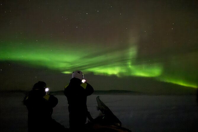Northern Light Snowmobile Tour in Kiruna - Leaving Kiruna for Jukkasjarvi after dark