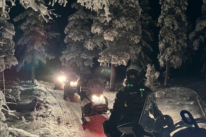 Northern Light Snowmobile Tour in Kiruna - The halfway break with lingonberry juice
