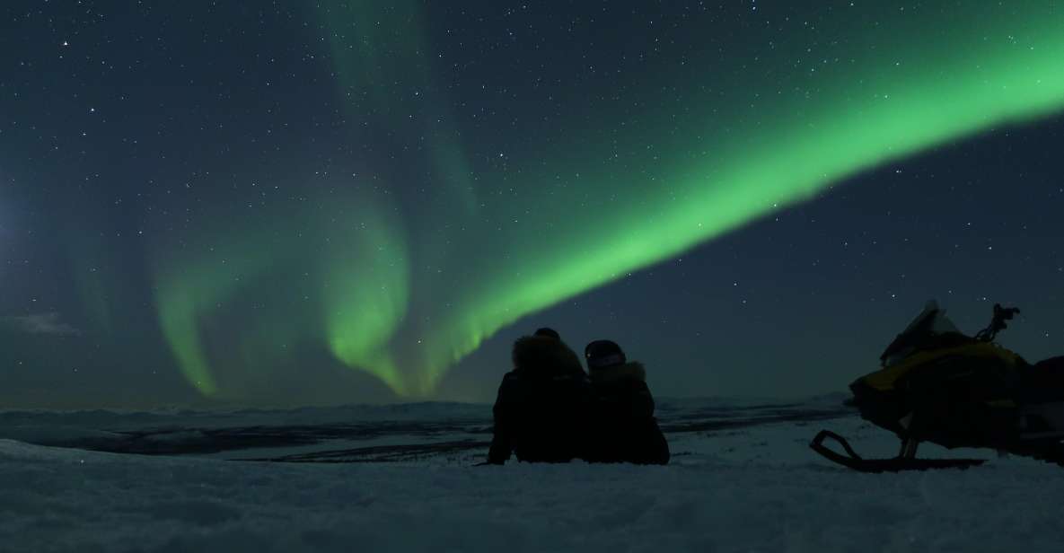 Premium Aurora Snowmobile Ride With Panoramic Views - Warming up inside the tipi