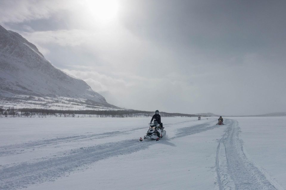 Snowmobile Adventure Abisko (Shared) - Riding through Abisko National Park at a steady pace