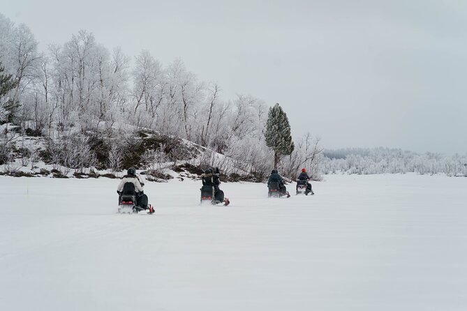 Snowmobile Tour in Kiruna - Driving across frozen lakes and rivers