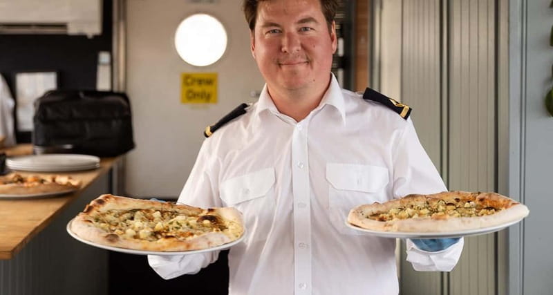 Stockholm: City Cruise with Fresh Pizza - Lake Hammarby shows modern Stockholm