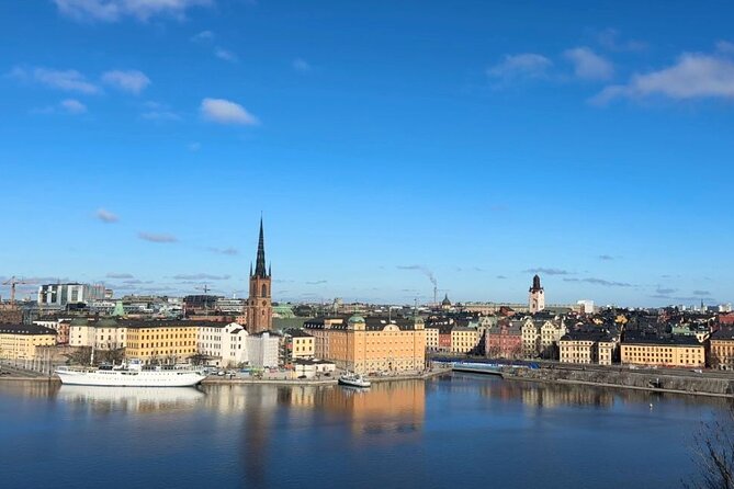Stockholm Small Group Food Tour with 7 Classic Food Tastings - Crossing toward Norrmalm along Drottninggatan