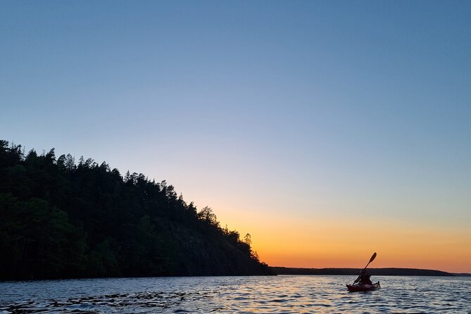 Sunset kayak tour with fika on Stockholms lakeside - A chance to see more than the sunset